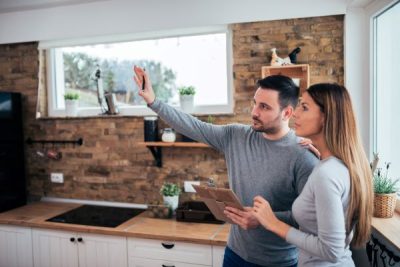 kitchen designer working with homeowner